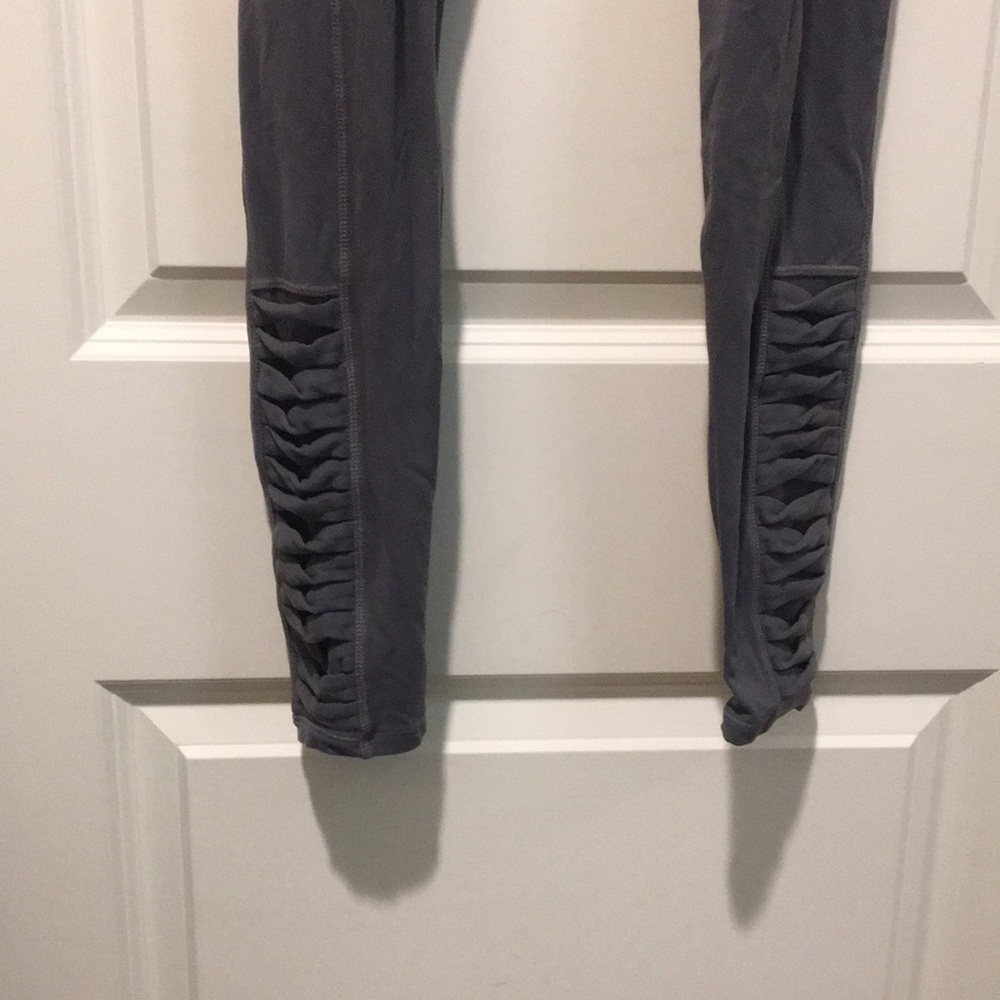Athleta Girl leggings detail cutouts bottom mesh, pockets pants kid Size 14 grey